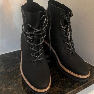 Toms Black water resistant combat boots never wore new without rage